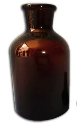 Frasco ámbar boca angosta esmerilado sin tapón.